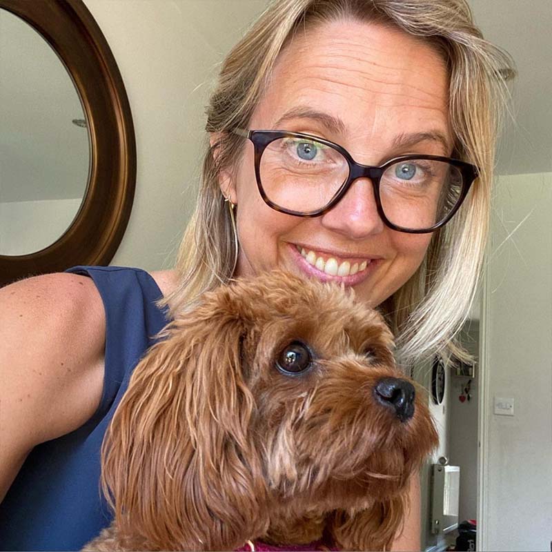 A selfie of Helen Addis with her friend's dog, Olive.